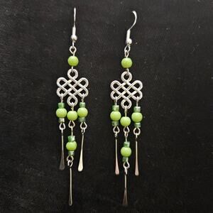 Antique silver Celtic knot and green glass chandelier earrings